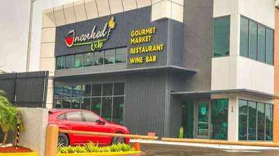 Candlelit dinner setting at Uncorked Restaurant near Drax Hall