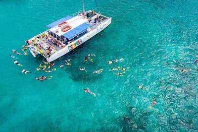 Catamaran sailing the turquoise Caribbean Sea off Ocho Rios