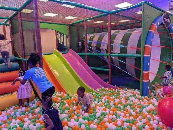 Tru Fun Park Drax Hall Jamaica - kids sliding into ball pit colourful play zone