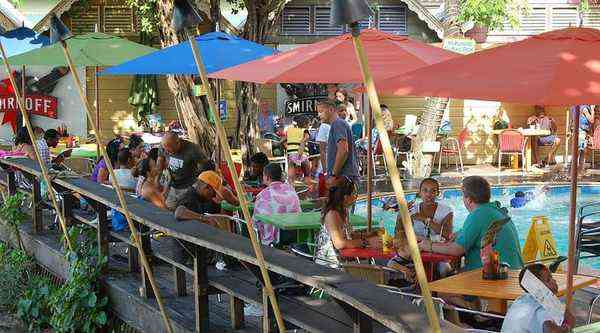 Margaritaville Ocho Rios Jamaica - lively outdoor bar tables pool tropical atmosphere