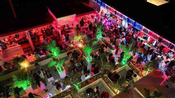 12/12 Day Lounge Drax Hall Jamaica - vibrant nightclub DJ party atmosphere