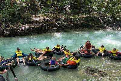 Inner tube floating through tropical jungle on the White River