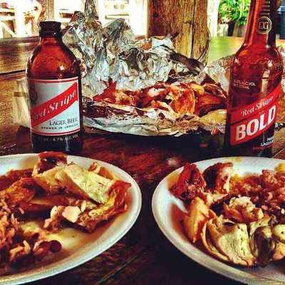 Jerk chicken and pork at Scotchies Jerk Centre