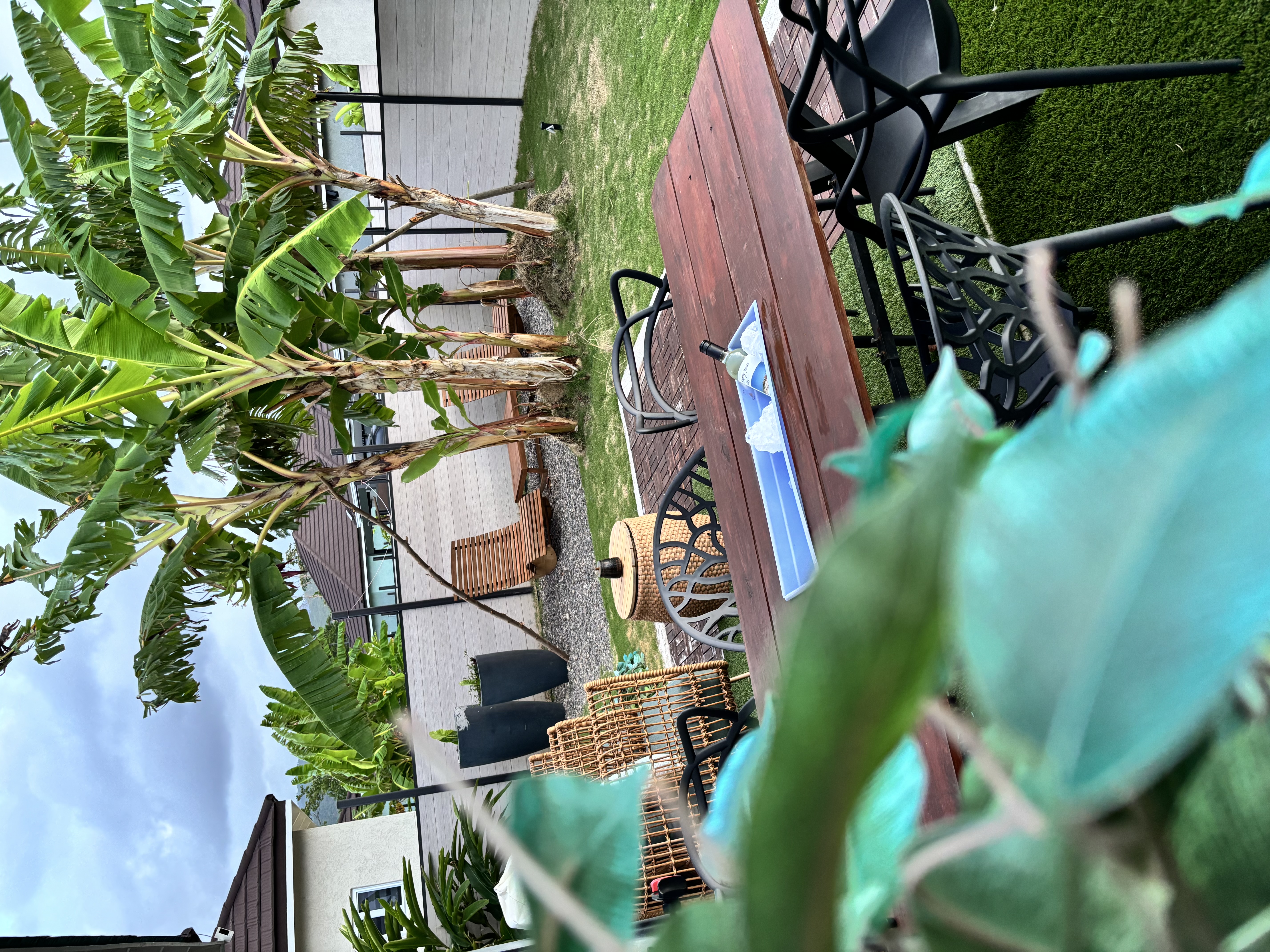 Outdoor dining table set for evening drinks